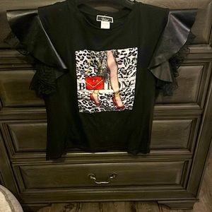 Black and leather T-shirt top size small with an animal print on the front